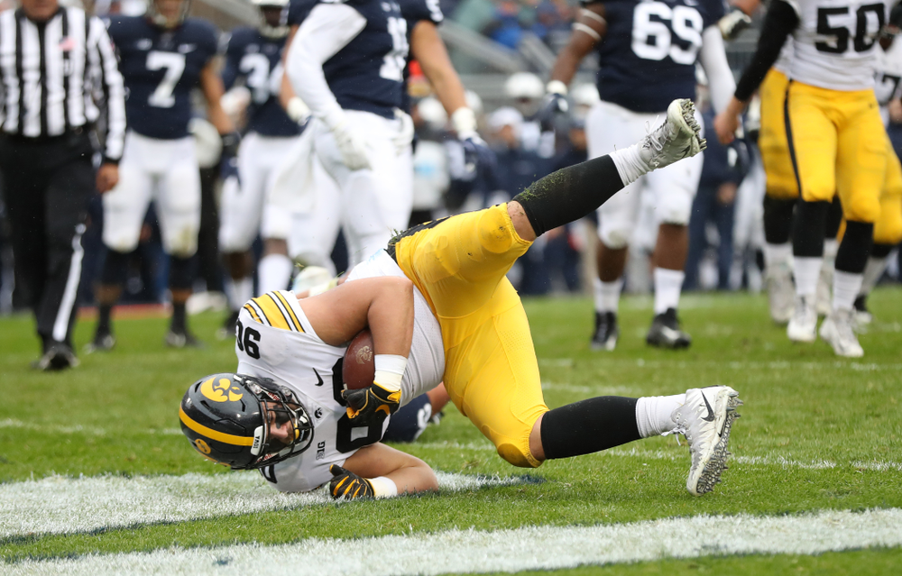 Iowa Hawkeyes defensive end Sam Brincks (90) catches a touchdown pass against the Penn State Nittany Lions Saturday, October 27, 2018 at Beaver Stadium in University Park, Pa. (Max Allen/hawkeyesports.com)