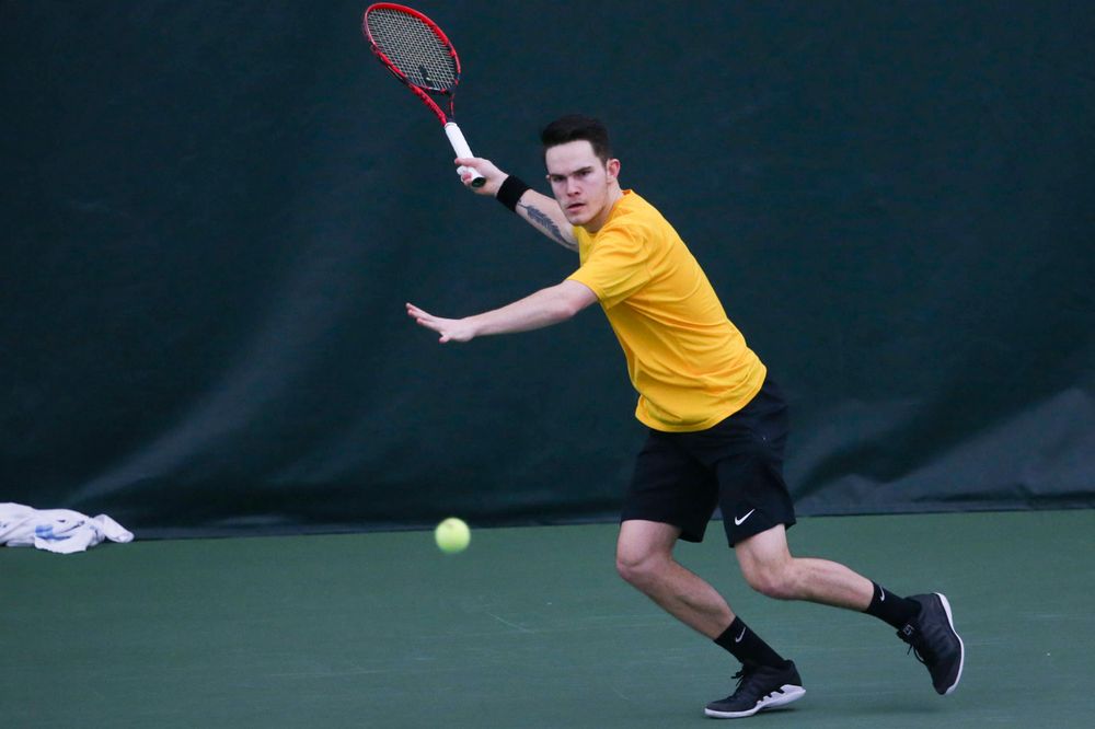 Iowa's Jonas Larsen at a tennis match vs Drake Friday, March 8, 2019 at the Hawkeye Tennis and Recreation Complex. (Lily Smith/hawkeyesports.com)
