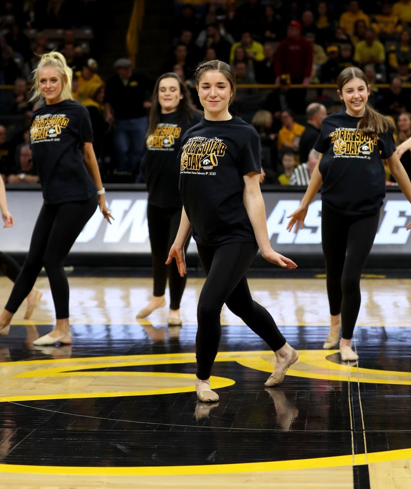 The Iowa Spirit Squad performs with participants in Spirit Squad Day at halftime of the Iowa Hawkeyes game against the Nebraska Cornhuskers Saturday, February 8, 2020 at Carver-Hawkeye Arena. (Brian Ray/hawkeyesports.com)