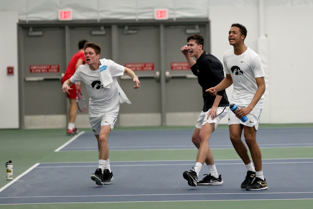 The Iowa Hawkeyes cheer on Nikita Snezhko against Cornell Sunday, March 8, 2020 at the Hawkeye Tennis and Recreation Center. (Brian Ray/hawkeyesports.com)