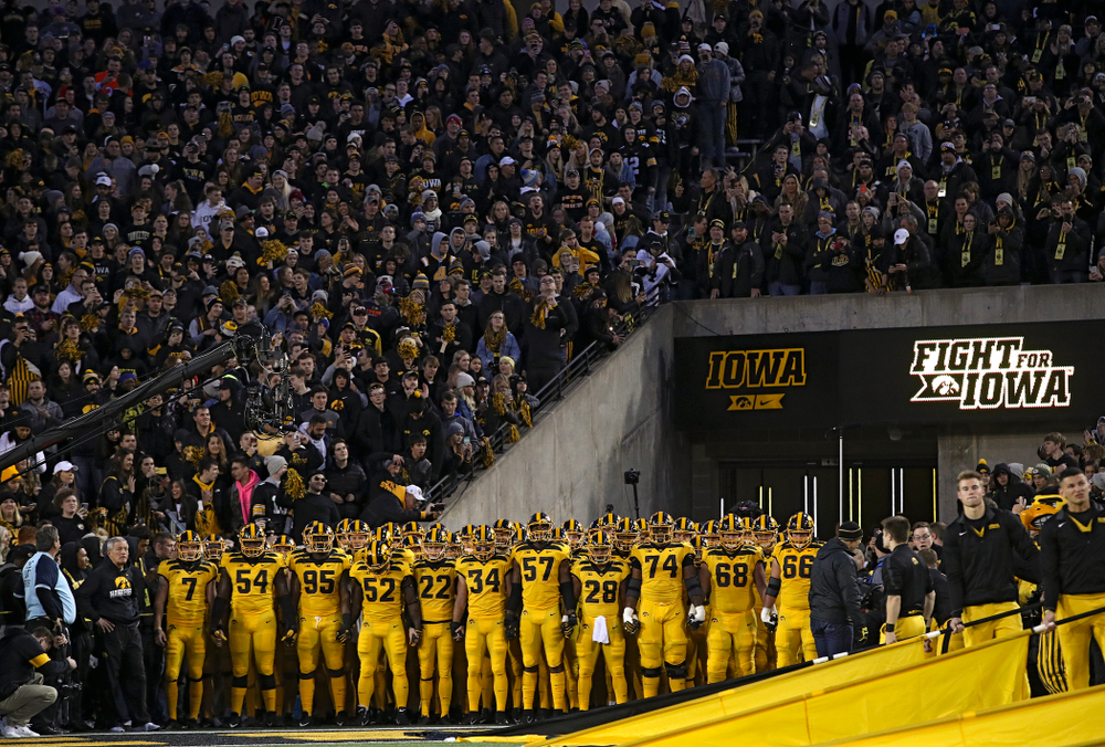 The Hawkeyes prepare to swarm the field before their game at Kinnick Stadium in Iowa City on Saturday, Oct 12, 2019. (Stephen Mally/hawkeyesports.com)