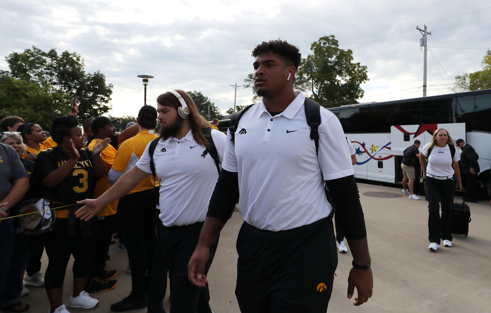 Iowa Hawkeyes offensive lineman Tristan Wirfs (74) and offensive lineman Kyler Schott (64) against the Rutgers Scarlet Knights Saturday, September 7, 2019 at Kinnick Stadium. (Brian Ray/hawkeyesports.com)