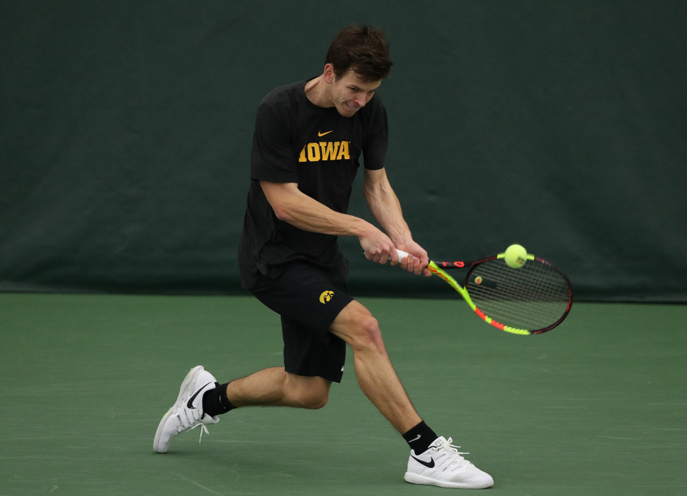 Iowa's Piotr Smietana against UMKC Friday, February 15, 2019 at the Hawkeye Tennis and Recreation Complex. (Brian Ray/hawkeyesports.com)