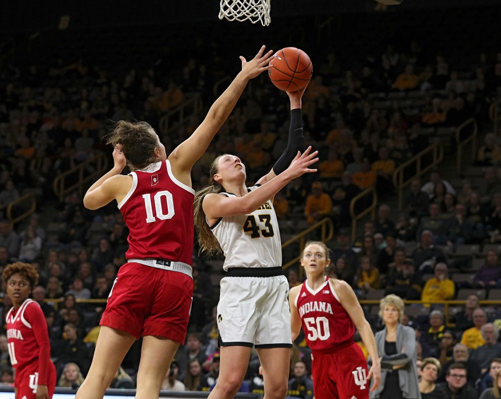 Iowa Hawkeyes forward Amanda Ollinger (43) makes a basket during the third quarter of their game at Carver-Hawkeye Arena in Iowa City on Sunday, January 12, 2020. (Stephen Mally/hawkeyesports.com)