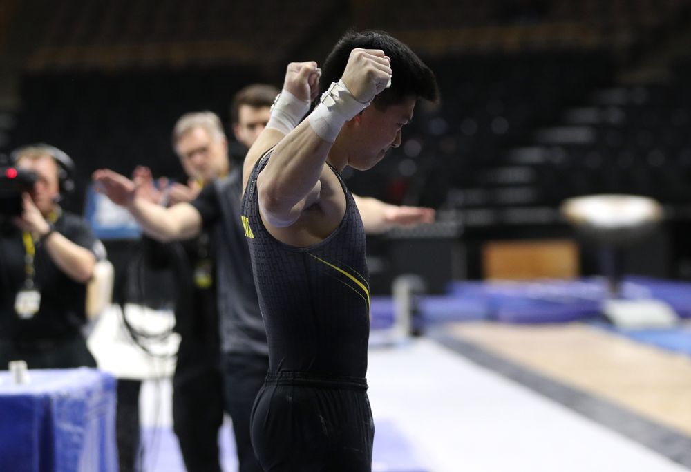 Iowa's Bennet Huang competes on the high bar against the Ohio State Buckeyes Saturday, March 16, 2019 at Carver-Hawkeye Arena. (Brian Ray/hawkeyesports.com)