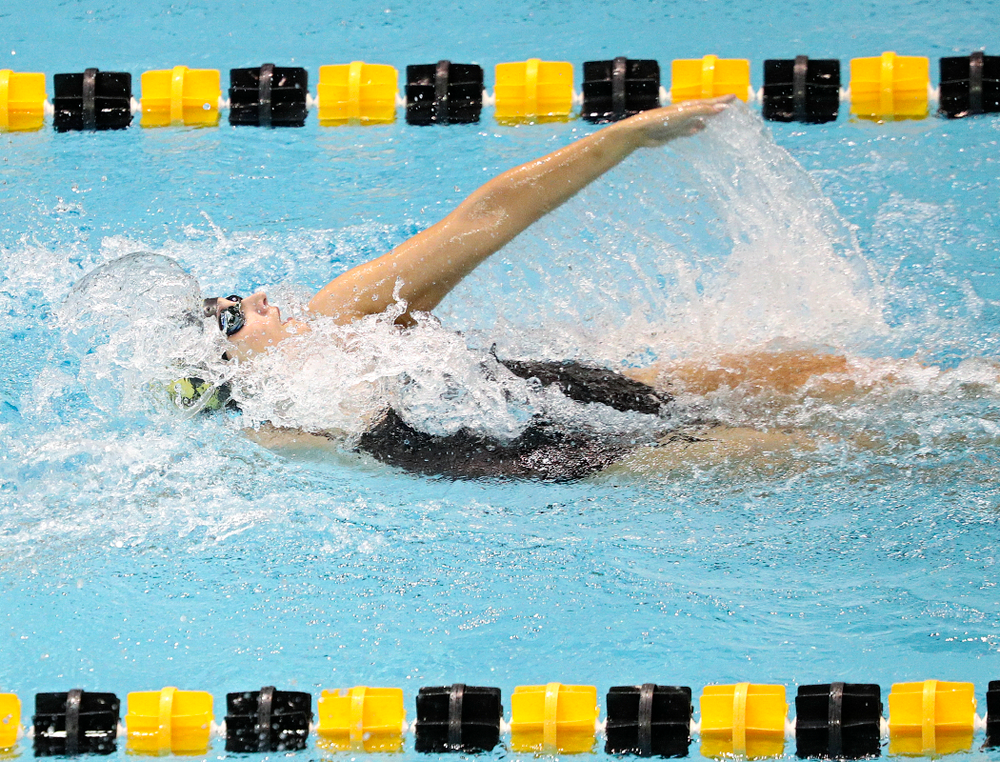 Iowa’s Hannah Burvill swims the women’s 100-yard backstroke event during their meet against Michigan State and Northern Iowa at the Campus Recreation and Wellness Center in Iowa City on Friday, Oct 4, 2019. (Stephen Mally/hawkeyesports.com)