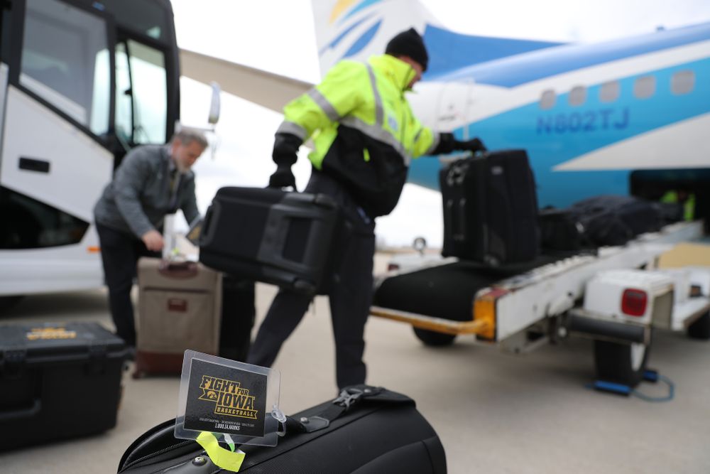 The Iowa Hawkeyes board a flight to Columbus for the first and second rounds of the 2019 NCAA Men's Basketball Tournament Wednesday, March 20, 2019 at the Eastern Iowa Airport. (Brian Ray/hawkeyesports.com)