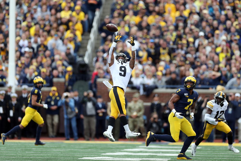 Iowa Hawkeyes defensive back Geno Stone (9) intercepts a pass against the Michigan Wolverines Saturday, October 5, 2019 at Michigan Stadium in Ann Arbor, MI. (Brian Ray/hawkeyesports.com)