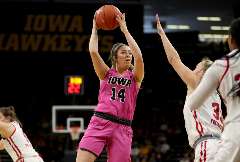 Iowa Hawkeyes forward McKenna Warnock (14) against the Wisconsin Badgers Sunday, February 16, 2020 at Carver-Hawkeye Arena. (Brian Ray/hawkeyesports.com)