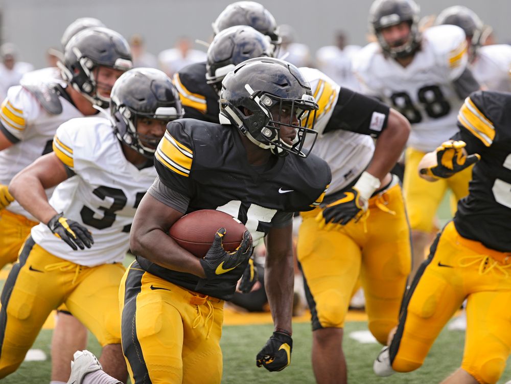 Iowa Hawkeyes running back Tyler Goodson (15) gets around the end for a touchdown run during Fall Camp Practice No. 10 at the Hansen Football Performance Center in Iowa City on Tuesday, Aug 13, 2019. (Stephen Mally/hawkeyesports.com)