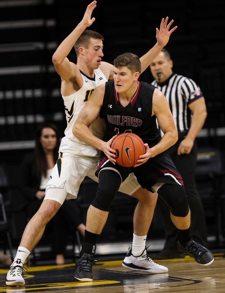 Iowa Hawkeyes guard Joe Wieskamp (10) defends in the paint during a game against Guilford College at Carver-Hawkeye Arena on November 4, 2018. (Tork Mason/hawkeyesports.com)