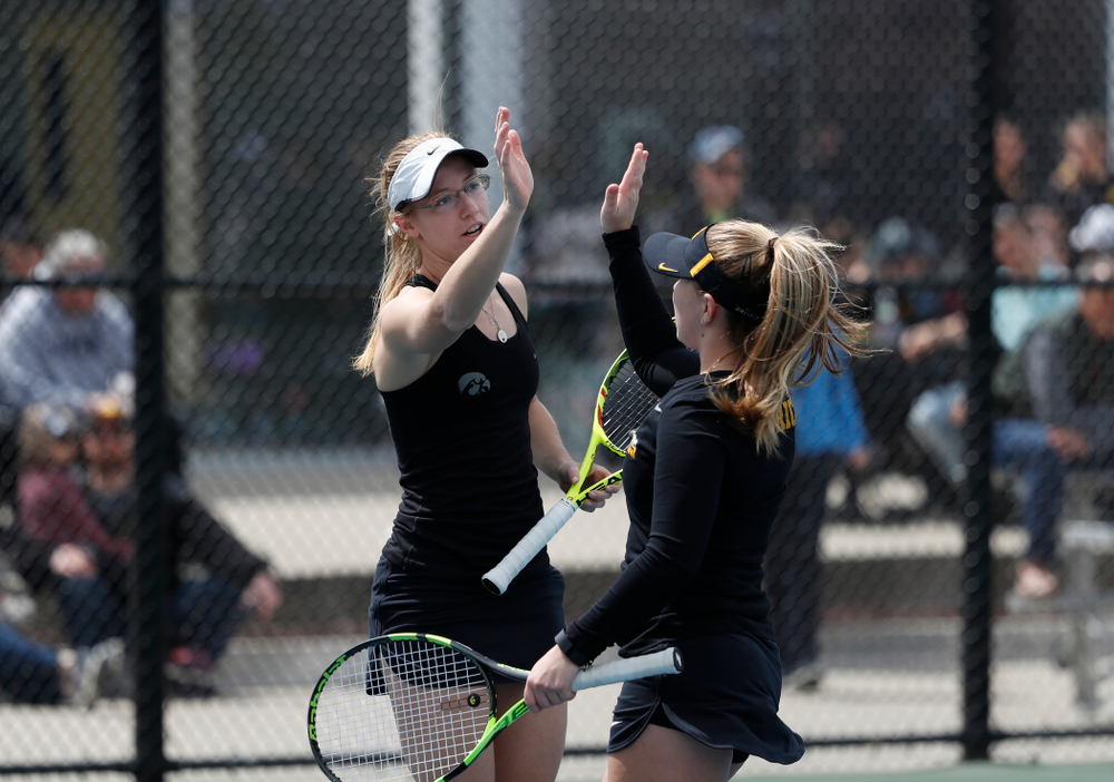 Montana Crawford and Danielle Burich play a doubles match against the Wisconsin Badgers Sunday, April 22, 2018 at the Hawkeye Tennis and Recreation Center. (Brian Ray/hawkeyesports.com)
