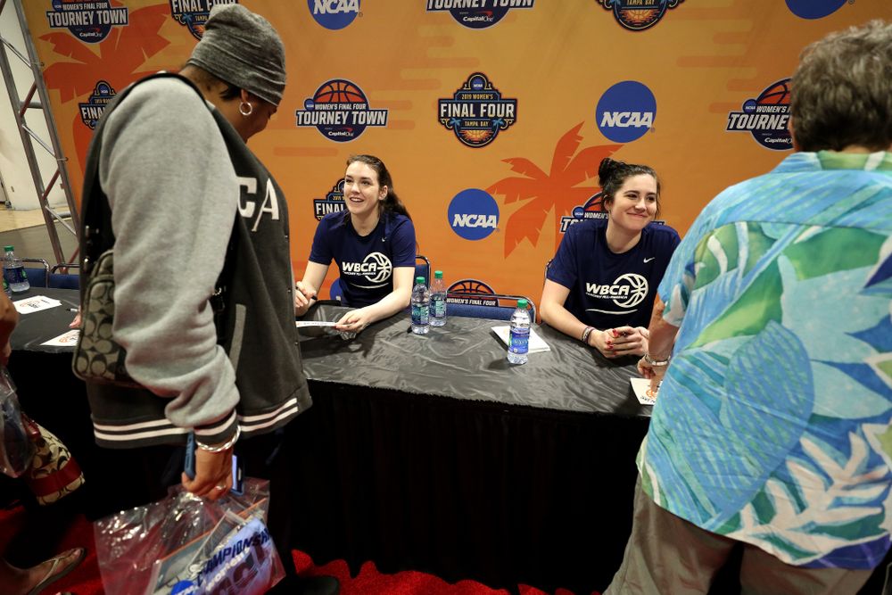 Iowa Hawkeyes forward Megan Gustafson (10) signs autographs with the other WBCA All Americans at the Tourney Town Fan Fest Friday, April 5, 2019 at the Tampa Convention Center in Tampa, FL. (Brian Ray/hawkeyesports.com)