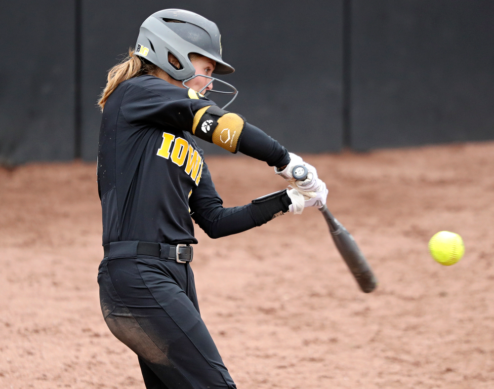 Iowa’s Aralee Bogar (2) hits an RBI triple during the sixth inning of their game against Iowa Softball vs Indian Hills Community College at Pearl Field in Iowa City on Sunday, Oct 6, 2019. (Stephen Mally/hawkeyesports.com)