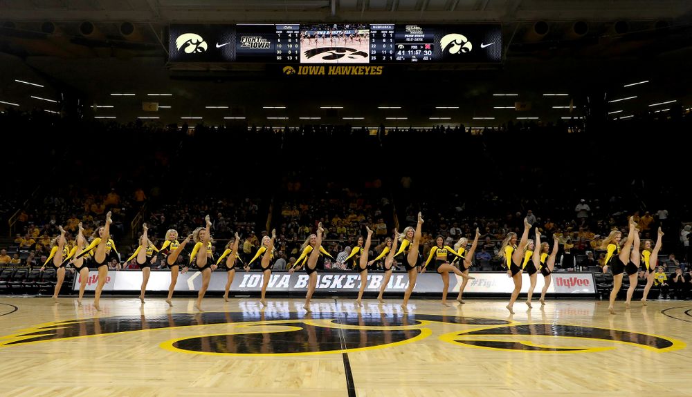 The Iowa Spirit Squad performs with participants in Spirit Squad Day at halftime of the Iowa Hawkeyes game against the Nebraska Cornhuskers Saturday, February 8, 2020 at Carver-Hawkeye Arena. (Brian Ray/hawkeyesports.com)