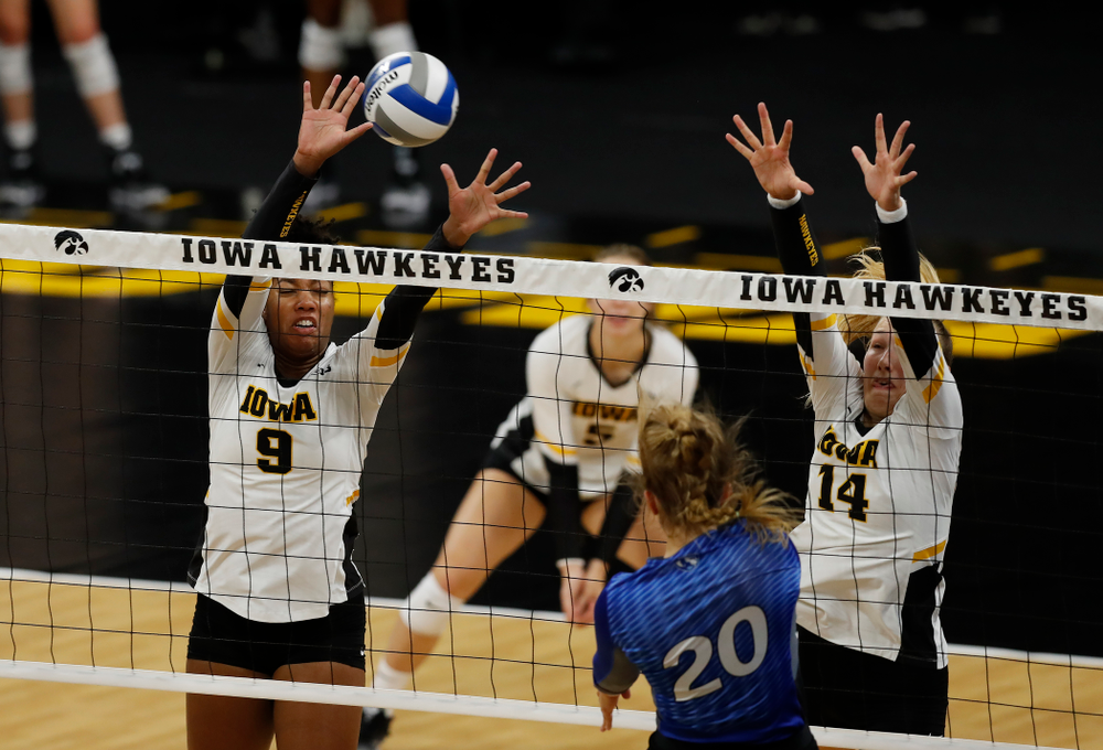 Iowa Hawkeyes middle blocker Amiya Jones (9) and outside hitter Cali Hoye (14) against Eastern Illinois Sunday, September 9, 2018 at Carver-Hawkeye Arena. (Brian Ray/hawkeyesports.com)