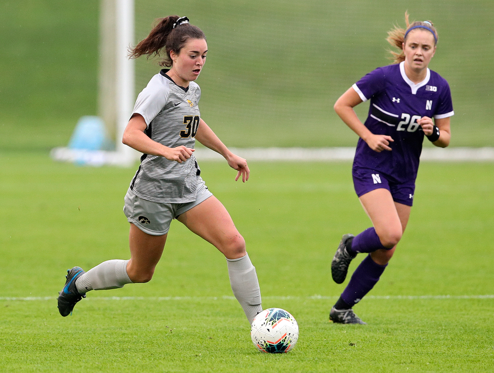 Iowa forward Devin Burns (30) moves with the ball during the first half of their match at the Iowa Soccer Complex in Iowa City on Sunday, Sep 29, 2019. (Stephen Mally/hawkeyesports.com)