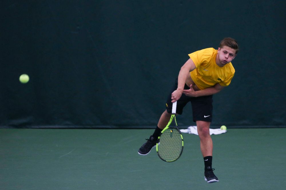 Iowa's Jonas Larsen at a tennis match vs Drake Friday, March 8, 2019 at the Hawkeye Tennis and Recreation Complex. (Lily Smith/hawkeyesports.com)