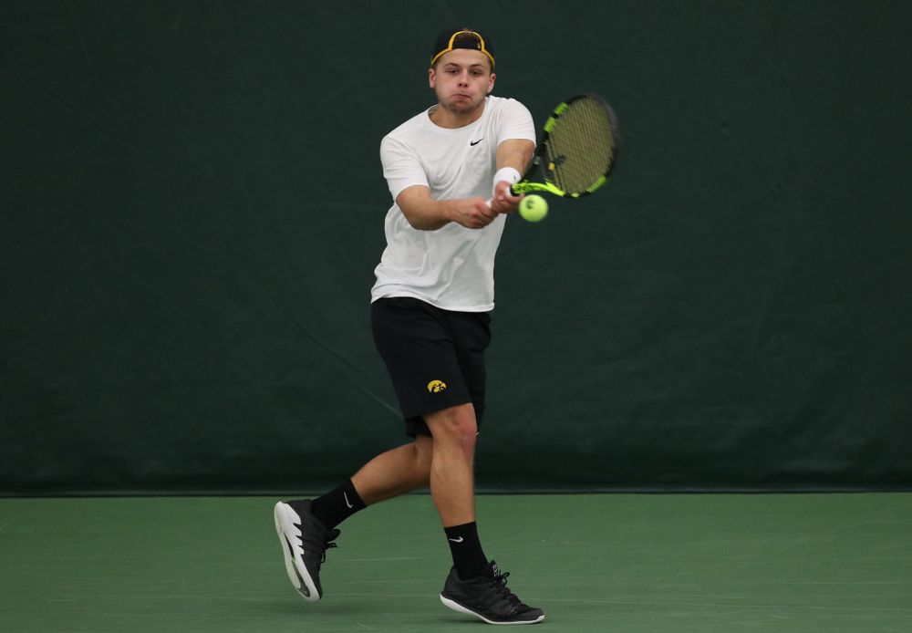 Iowa's Will Davies against UMKC Friday, February 15, 2019 at the Hawkeye Tennis and Recreation Complex. (Brian Ray/hawkeyesports.com)