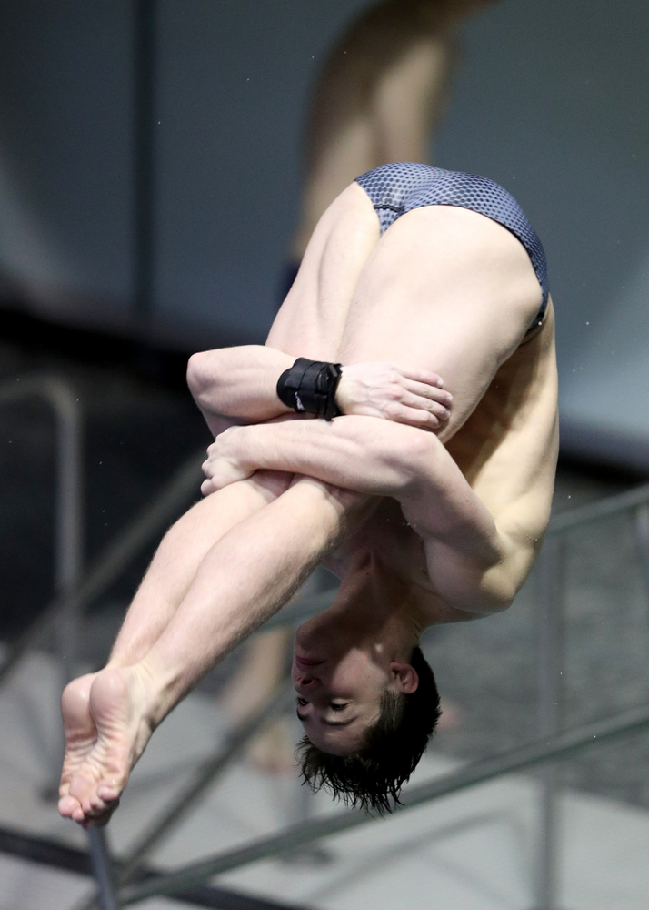 IowaÕs Michael Huebner competes on the 1 meter springboard against Notre Dame and Illinois Saturday, January 11, 2020 at the Campus Recreation and Wellness Center. (Brian Ray/hawkeyesports.com)