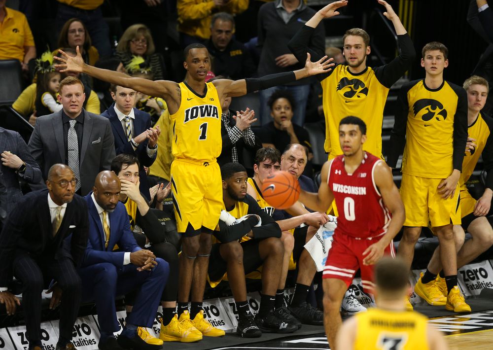 Iowa Hawkeyes guard Maishe Dailey (1) and Iowa Hawkeyes forward Riley Till (20) cheer from the bench against Wisconsin on November 30, 2018 at Carver-Hawkeye Arena. (Tork Mason/hawkeyesports.com)