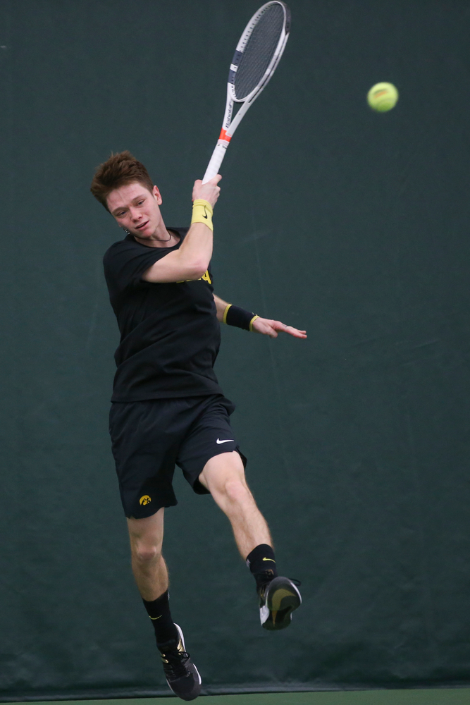 Iowa’s Jason Kerst returns a hit during the Iowa men’s tennis meet vs VCU on Saturday, February 29, 2020 at the Hawkeye Tennis and Recreation Complex. (Lily Smith/hawkeyesports.com)
