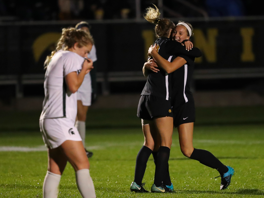 Iowa Hawkeyes midfielder Hailey Rydberg (2) and Iowa Hawkeyes midfielder Natalie Winters (10) celebrate after Rydberg's goal during a game against Michigan State at the Iowa Soccer Complex on October 12, 2018. (Tork Mason/hawkeyesports.com)