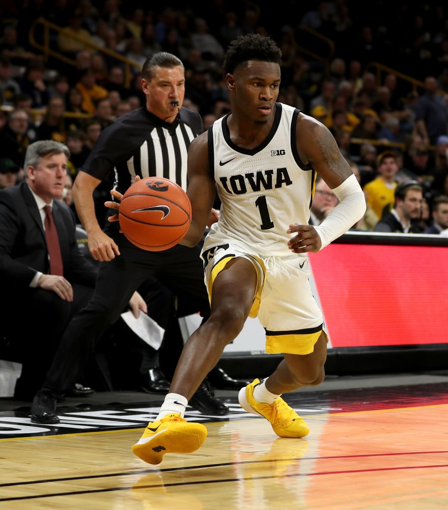 Iowa Hawkeyes guard Joe Toussaint (1) against the Minnesota Golden Gophers Monday, December 9, 2019 at Carver-Hawkeye Arena. (Brian Ray/hawkeyesports.com)