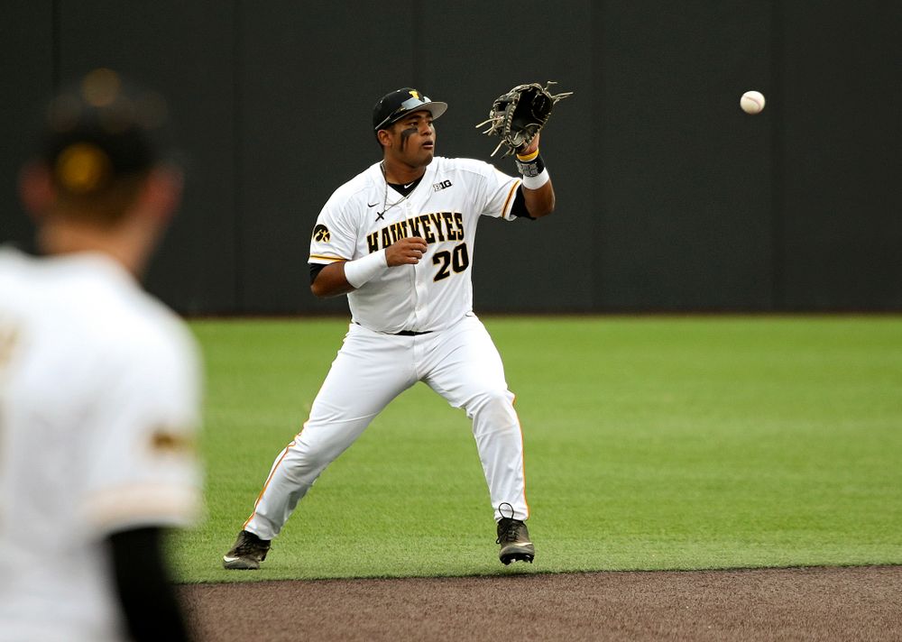 Iowa infielder Izaya Fullard (20) fields a ground ball before throwing to first for an out during the sixth inning of their college baseball game at Duane Banks Field in Iowa City on Wednesday, March 11, 2020. (Stephen Mally/hawkeyesports.com)