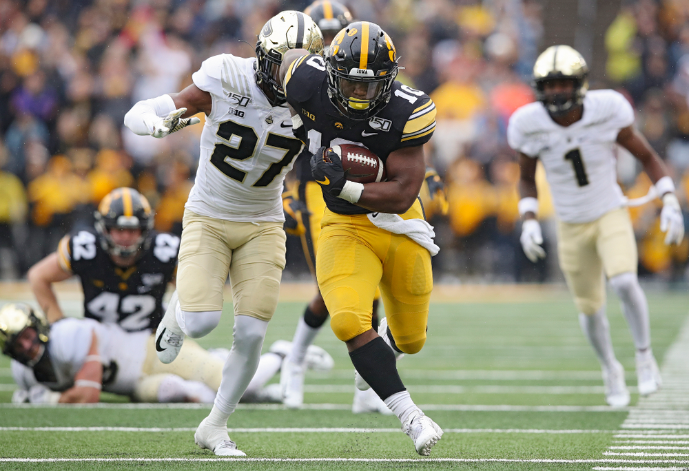 Iowa Hawkeyes running back Mekhi Sargent (10) on a run during the fourth quarter of their game at Kinnick Stadium in Iowa City on Saturday, Oct 19, 2019. (Stephen Mally/hawkeyesports.com)