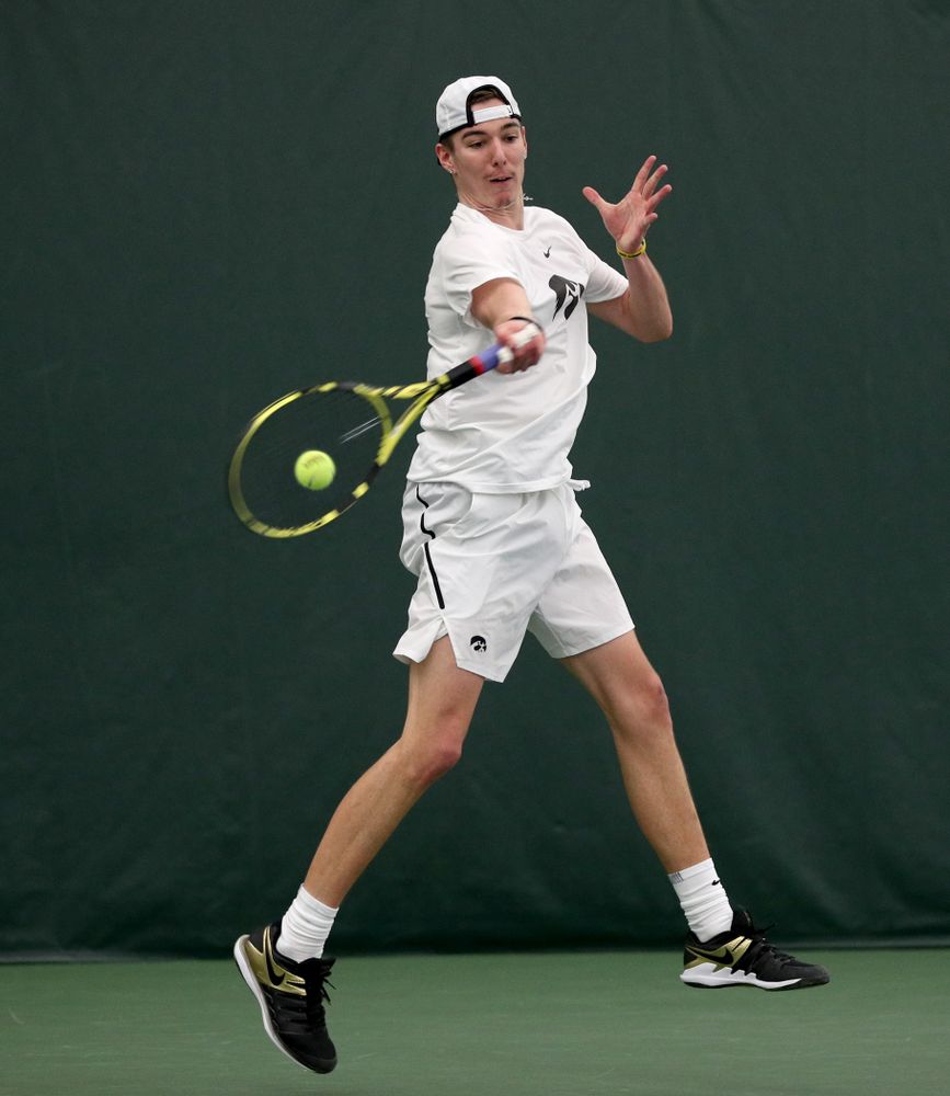 Iowa’s Nikita Snezhko against Cornell Sunday, March 8, 2020 at the Hawkeye Tennis and Recreation Center. (Brian Ray/hawkeyesports.com)