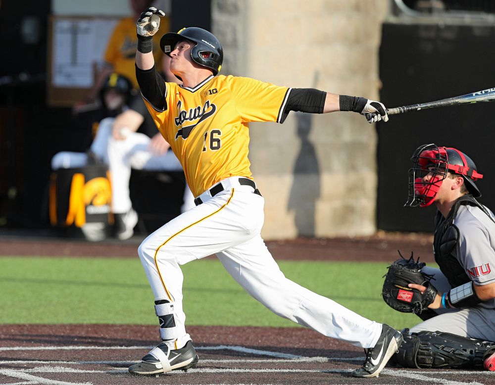 Iowa Hawkeyes shortstop Tanner Wetrich (16) hits a home run during the fifth inning of their game against Northern Illinois at Duane Banks Field in Iowa City on Tuesday, Apr. 16, 2019. (Stephen Mally/hawkeyesports.com)