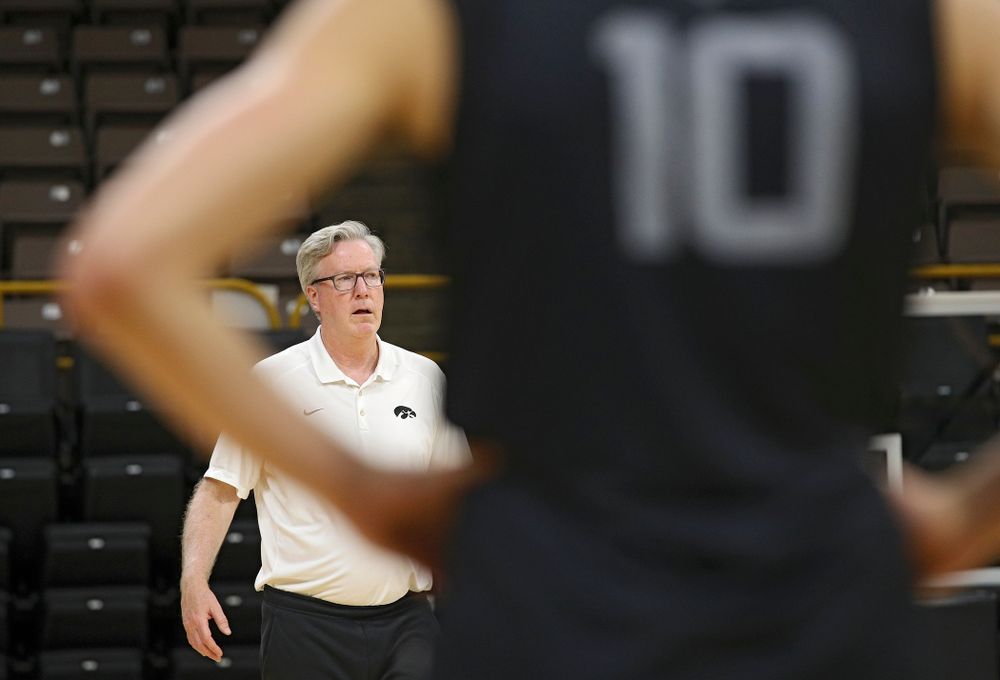 Iowa Hawkeyes head coach Fran McCaffery talks with his players as guard Joe Wieskamp (10) looks on during practice at Carver-Hawkeye Arena in Iowa City on Monday, Sep 30, 2019. (Stephen Mally/hawkeyesports.com)