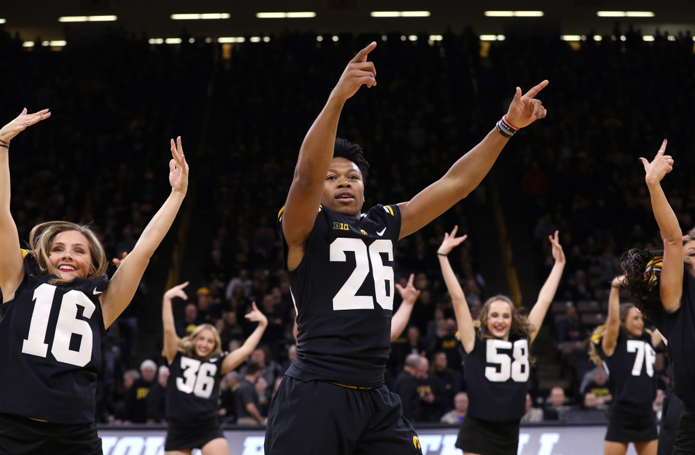 The Iowa Dance Team performs with the Iowa Football Team at halftime of the Iowa Hawkeyes game against the Indiana Hoosiers Friday, February 22, 2019 at Carver-Hawkeye Arena. (Brian Ray/hawkeyesports.com)