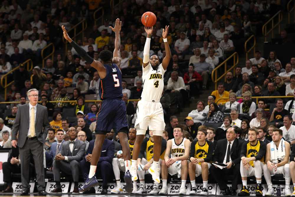 Iowa Hawkeyes guard Isaiah Moss (4) knocks down a three point basket against the Illinois Fighting Illini Sunday, January 20, 2019 (Brian Ray/hawkeyesports.com)