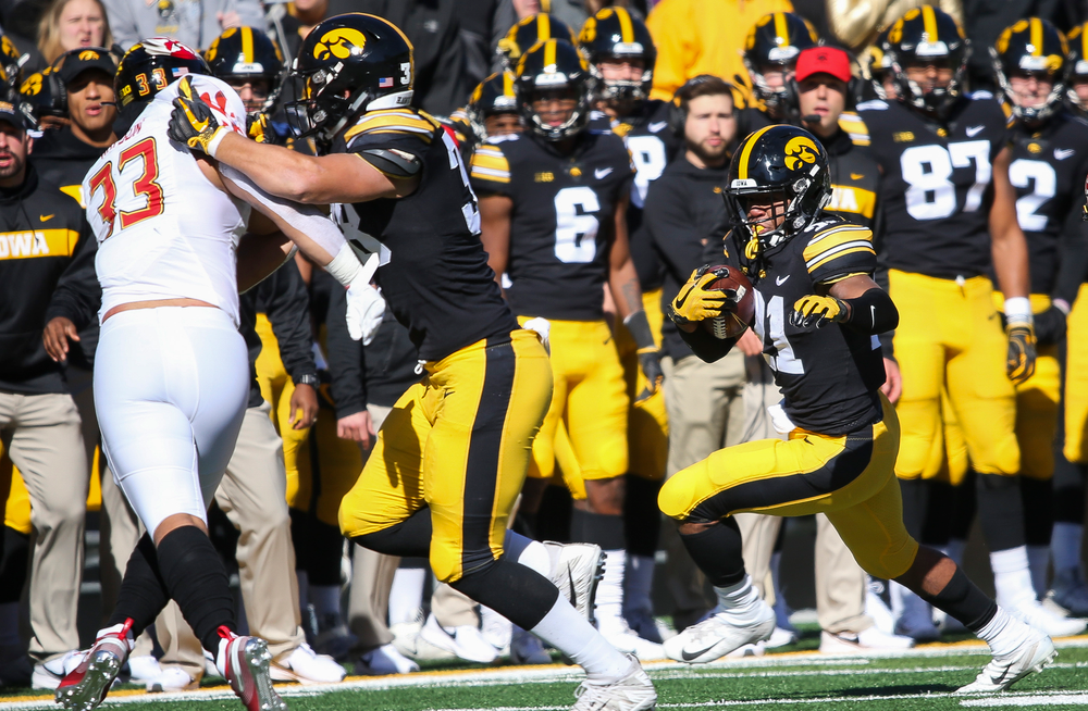 Iowa Hawkeyes running back Ivory Kelly-Martin (21) runs the ball during a game against Maryland at Kinnick Stadium on October 20, 2018. (Tork Mason/hawkeyesports.com)