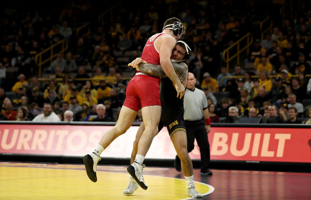 IowaÕs Pat Lugo wrestles WisconsinÕs Cole Martin at 149 pounds Sunday, December 1, 2019 at Carver-Hawkeye Arena. Lugo won the match 5-3. (Brian Ray/hawkeyesports.com)