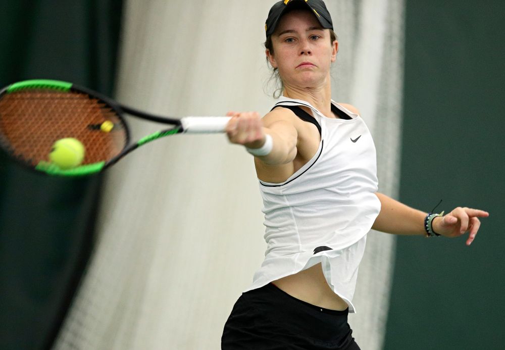 Iowa’s Elise Van Heuvelen returns a shot during her singles match at the Hawkeye Tennis and Recreation Complex in Iowa City on Sunday, February 16, 2020. (Stephen Mally/hawkeyesports.com)
