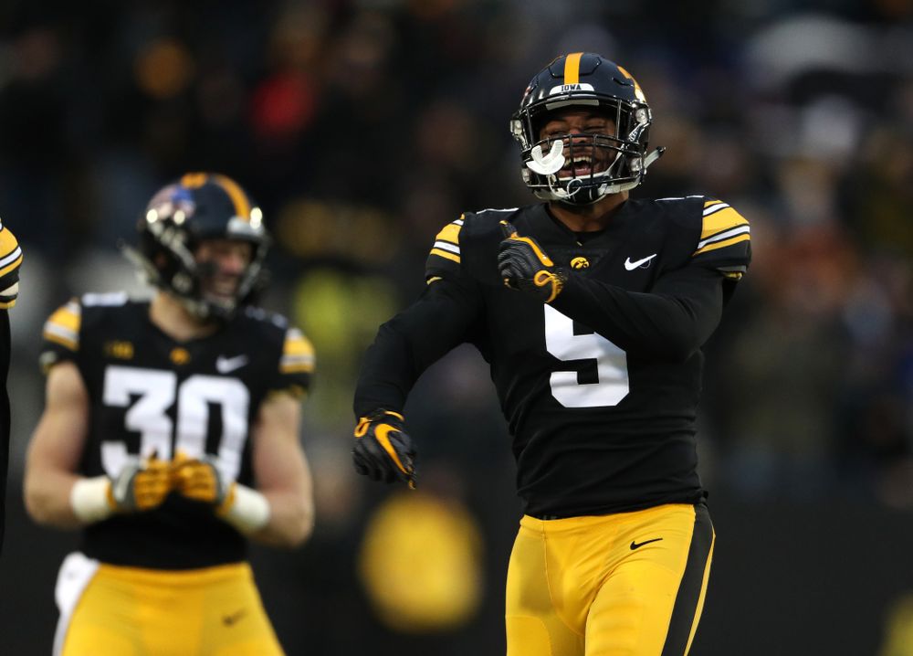 Iowa Hawkeyes defensive back Geno Stone (9) intercepts a pass against the Northwestern Wildcats Saturday, November 10, 2018 at Kinnick Stadium. (Brian Ray/hawkeyesports.com)