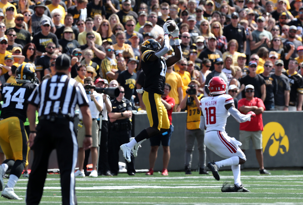Iowa Hawkeyes defensive back Michael Ojemudia (11) intercepts a pass against the Rutgers Scarlet Knights Saturday, September 7, 2019 at Kinnick Stadium. (Brian Ray/hawkeyesports.com)