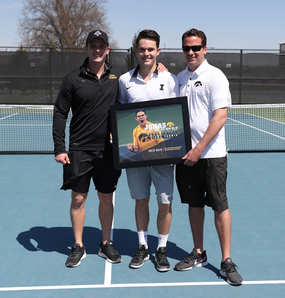 IowaÕs Jonas Larsen is honored during senior day ceremonies before their game against the Michigan Wolverines Sunday, April 21, 2019 at the Hawkeye Tennis and Recreation Complex. (Brian Ray/hawkeyesports.com)