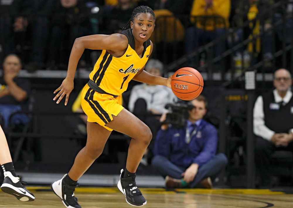 Iowa Hawkeyes guard Tomi Taiwo (1) brings the ball down the court during the second quarter of their game at Carver-Hawkeye Arena in Iowa City on Thursday, January 23, 2020. (Stephen Mally/hawkeyesports.com)