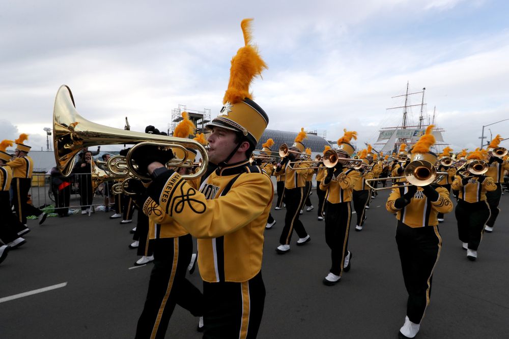The Hawkeye Marching Band and the Iowa Spirit Squad march in the Holiday Bowl Parade Thursday, December 26, 2019 in San Diego. (Brian Ray/hawkeyesports.com)