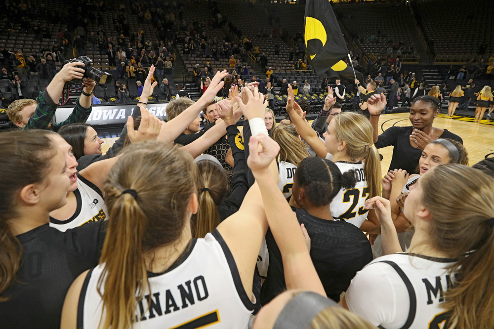The Hawkeyes huddle after their overtime win against Princeton at Carver-Hawkeye Arena in Iowa City on Wednesday, Nov 20, 2019. (Stephen Mally/hawkeyesports.com)