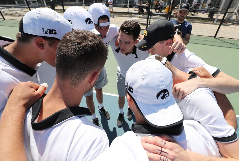 IowaÕs Jonas Larsen pumps up his teammates before their game against the Michigan Wolverines Sunday, April 21, 2019 at the Hawkeye Tennis and Recreation Complex. (Brian Ray/hawkeyesports.com)