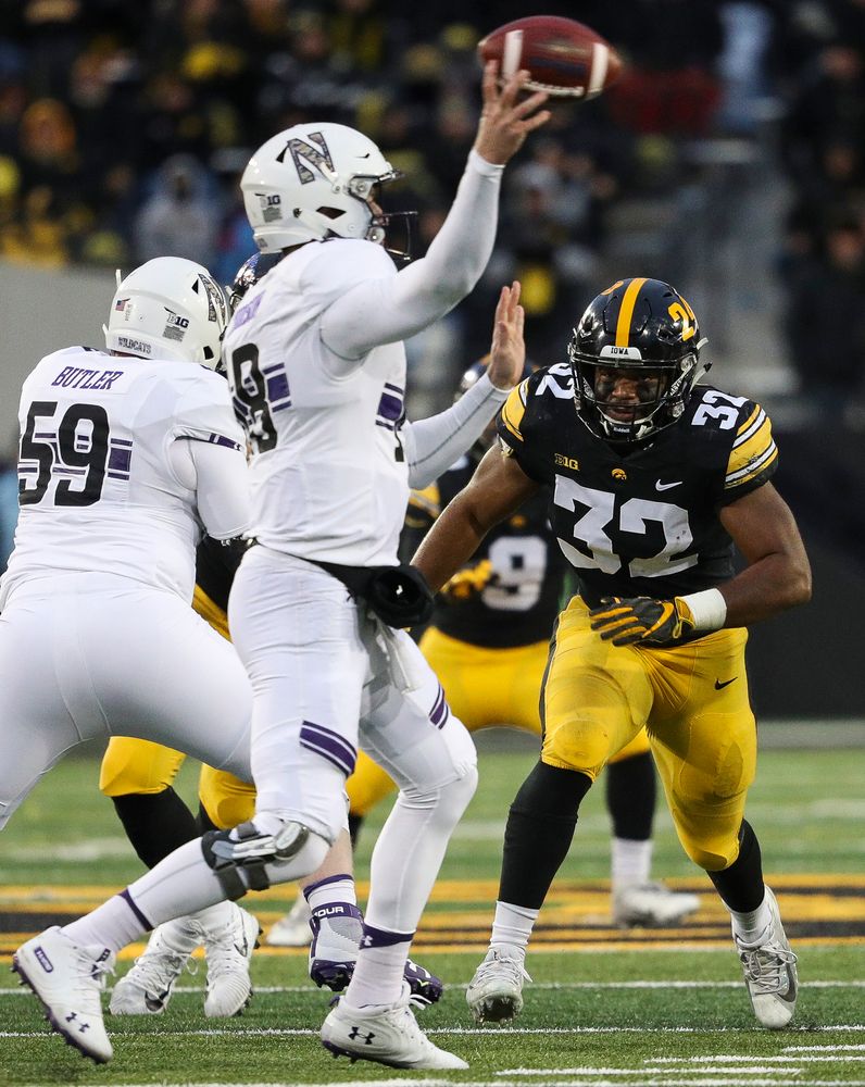 Iowa Hawkeyes linebacker Djimon Colbert (32) rushes the quarterback during a game against Northwestern at Kinnick Stadium on November 10, 2018. (Tork Mason/hawkeyesports.com)