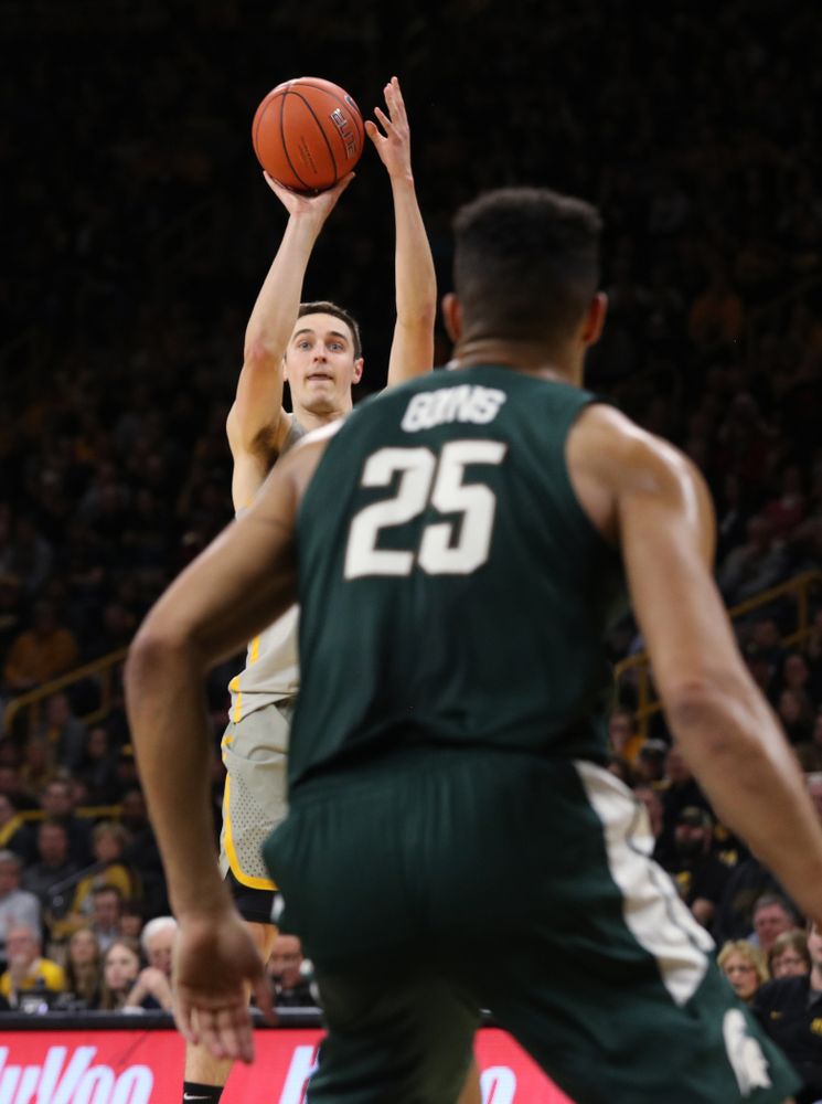 Iowa Hawkeyes forward Nicholas Baer (51) against the Michigan State Spartans Thursday, January 24, 2019 at Carver-Hawkeye Arena. (Brian Ray/hawkeyesports.com)