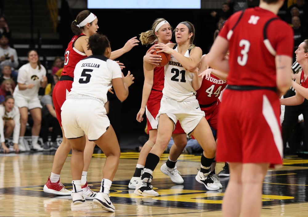 Iowa Hawkeyes forward Hannah Stewart (21) grabs an offensive rebound late against the Nebraska Cornhuskers Thursday, January 3, 2019 at Carver-Hawkeye Arena. (Brian Ray/hawkeyesports.com)