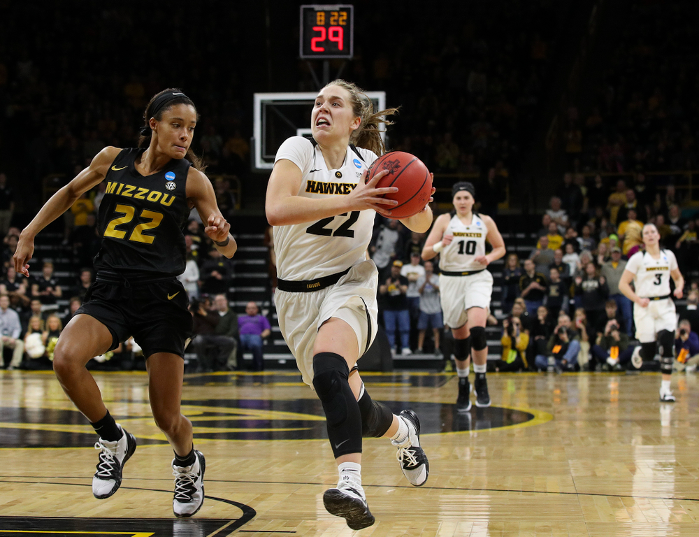 Iowa Hawkeyes guard Kathleen Doyle (22) drives in to the basket after a steal during the fourth quarter of their second round game in the 2019 NCAA Women's Basketball Tournament at Carver Hawkeye Arena in Iowa City on Sunday, Mar. 24, 2019. (Stephen Mally for hawkeyesports.com)