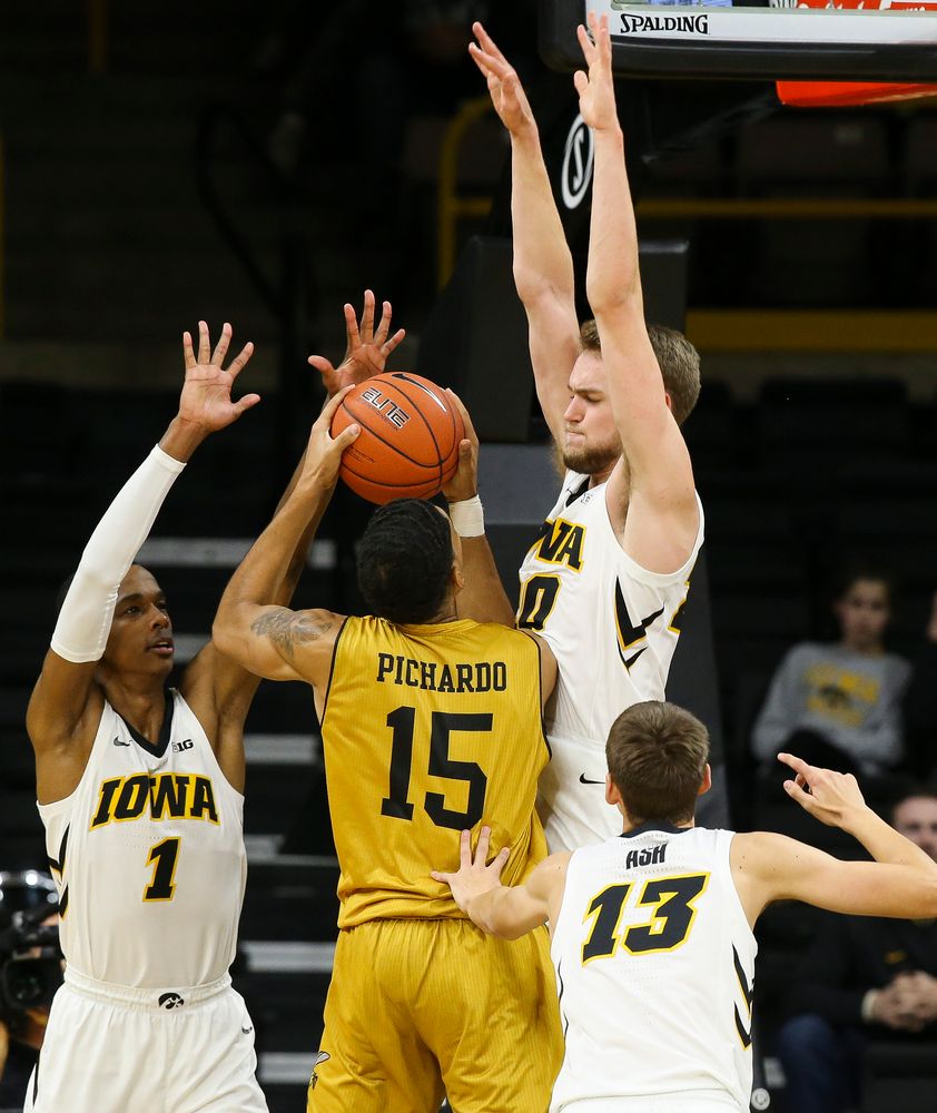 Iowa Hawkeyes guard Maishe Dailey (1) and Iowa Hawkeyes forward Riley Till (20) contest a shot during a game against Alabama State at Carver-Hawkeye Arena on November 21, 2018. (Tork Mason/hawkeyesports.com)